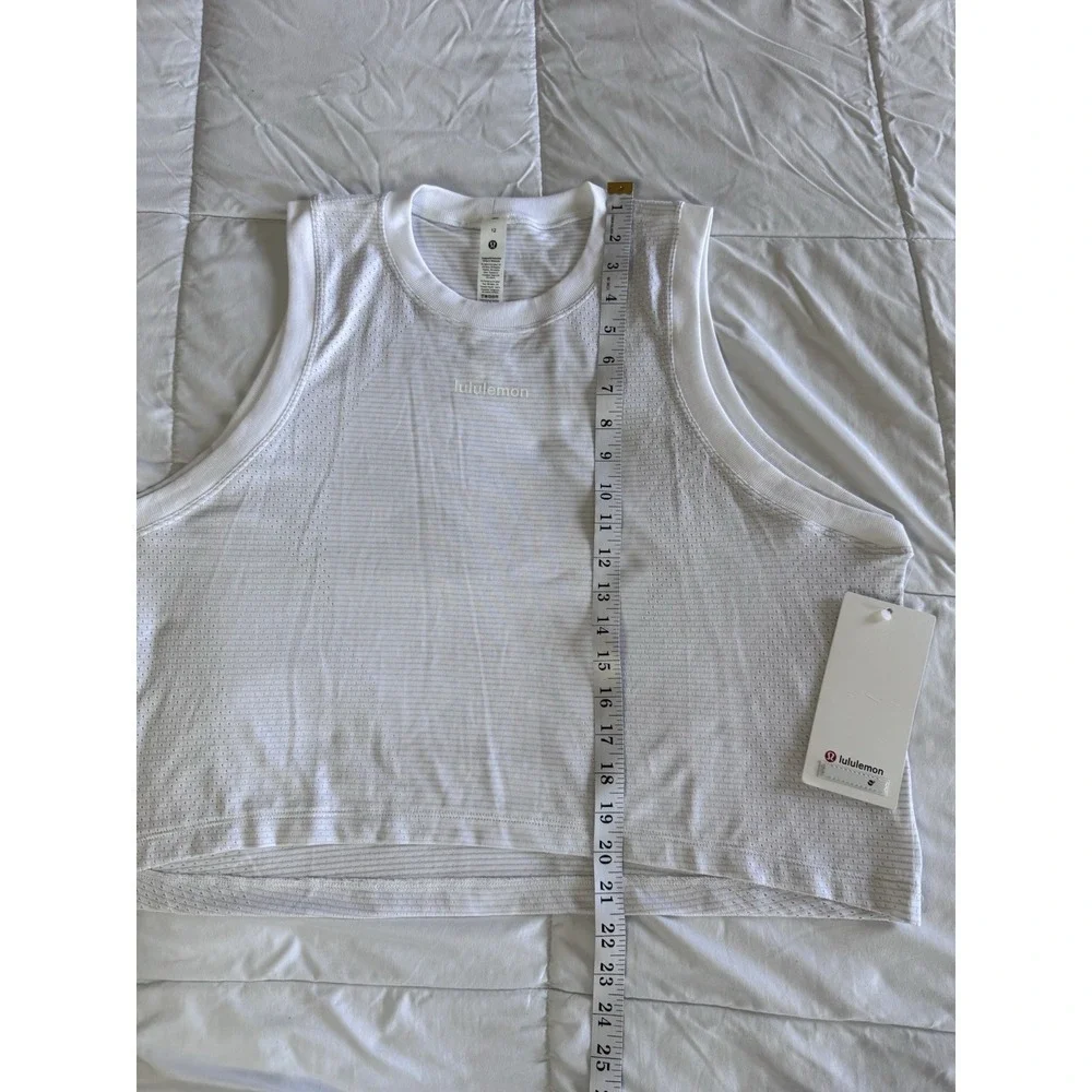 Lululemon SWIFTLY HIGH LOW CROPPED TANK TOP WHITE SIZE 12 Word Logo NWT